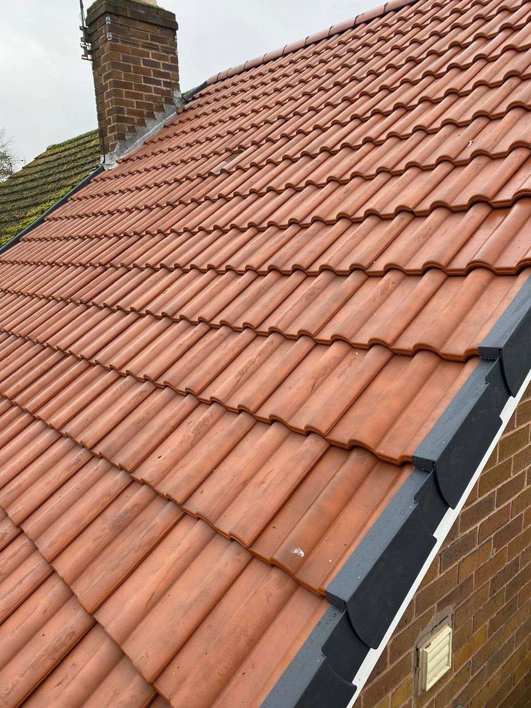 Completed red tiled roof personally completed by Harris Roof Systems