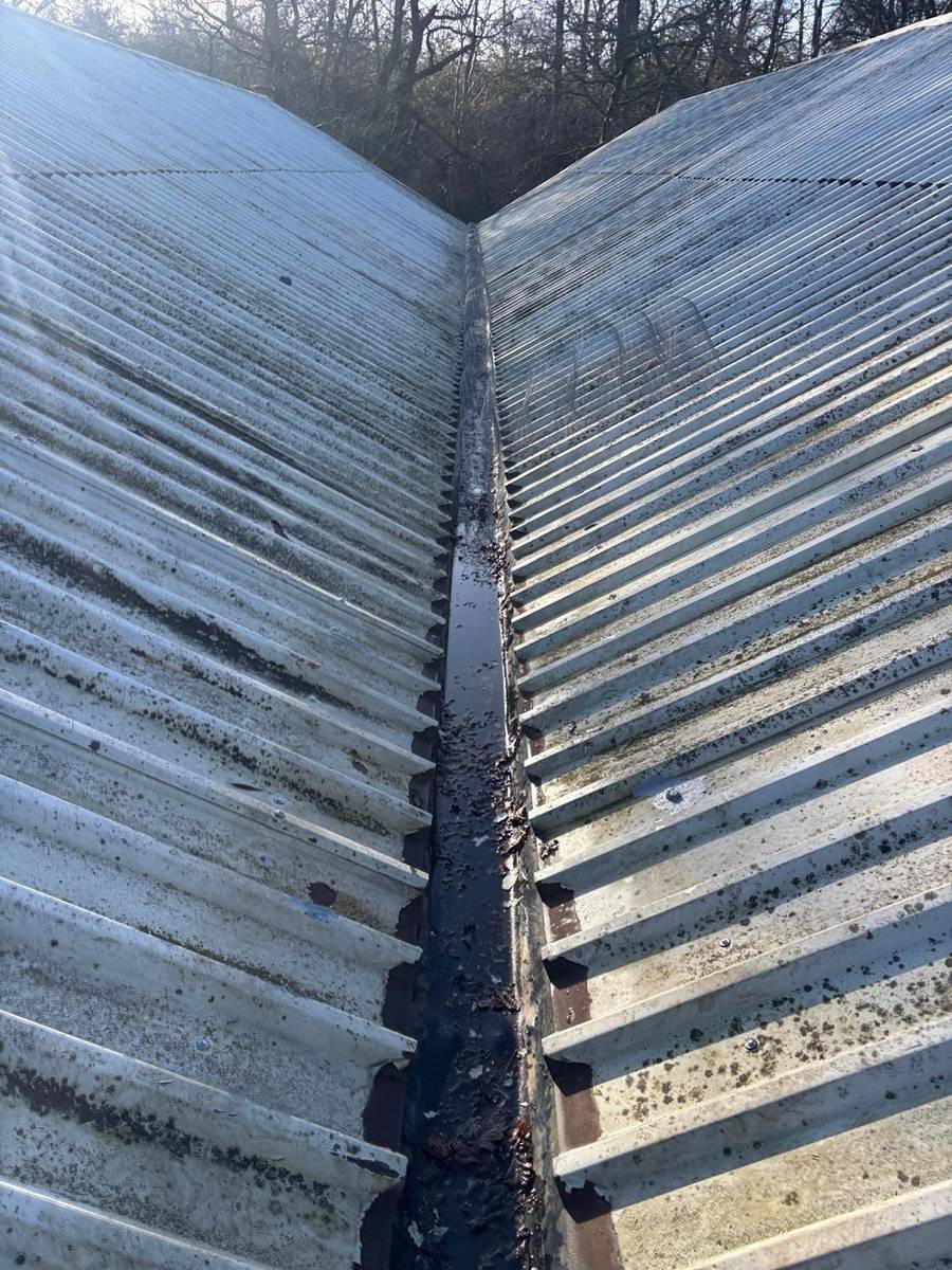 Commercial roof valley / gutter maintenance area