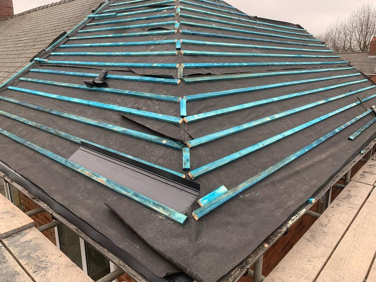 Slate roof during installation